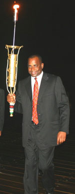 PM Skerrit Carrying Reunion Torch